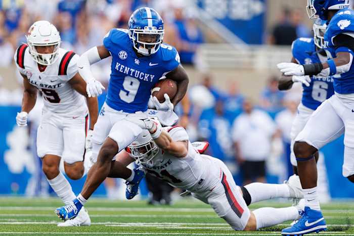Sep 2, 2023; Lexington, Kentucky, USA; Kentucky Wildcats wide receiver Tayvion Robinson (9) carries the ball during the second quarter against the Ball State Cardinals at Kroger Field. Mandatory Credit: Jordan Prather-USA TODAY Sports